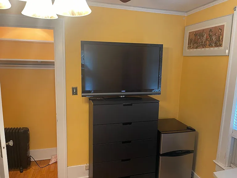 2nd Floor - North West Bedroom - Private 3.1 cu ft refrigerator; 5 drawer dresser with lighted closet