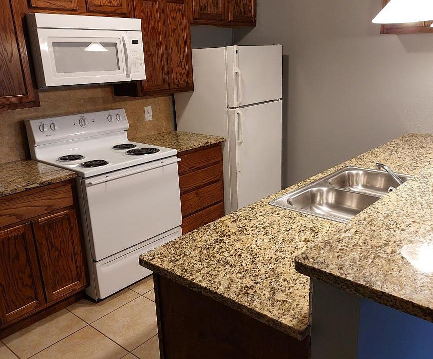 Kitchen comes with stove, refrigerator, microwave and dishwasher.
