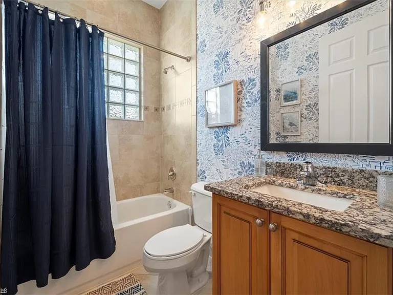 6670 Marbella Ln — Photo 16