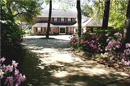 Welcome to 400 Tiger Pointe Drive on the protected deep water of Sarah Ann Bayou!