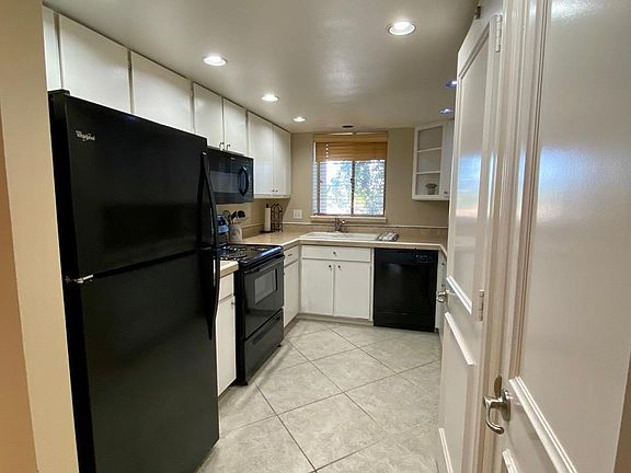 Great Galley Kitchen with Washer Dryer