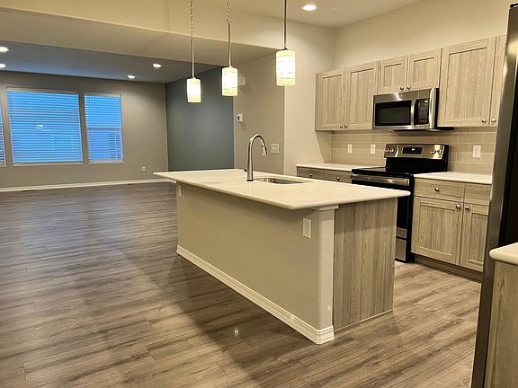 Main Level - Evening view of Kitchen and Living together