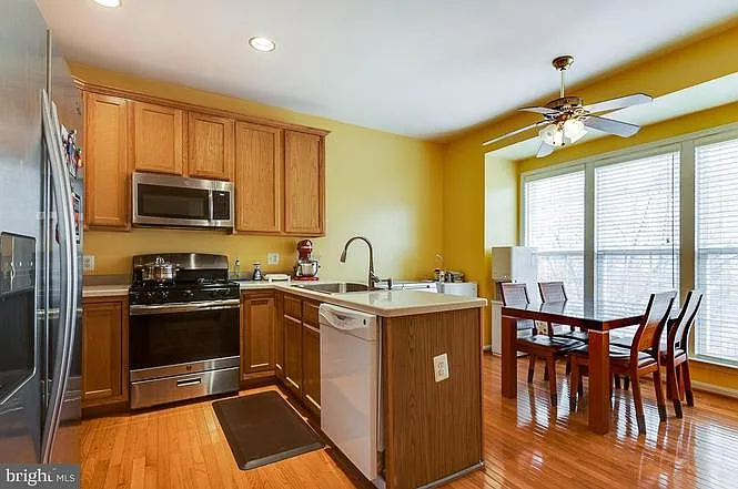 Kitchen has been recently renovated with granite countertops and new appliances.