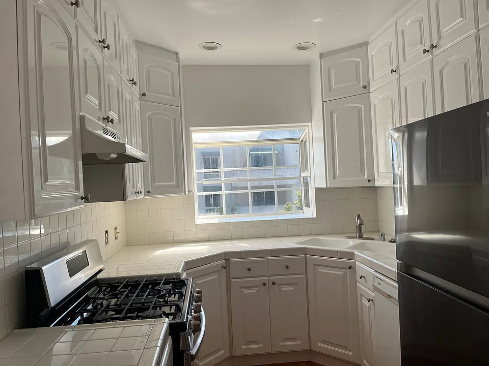 KITCHEN: Stainless Steel Refrigerator, Stove & Dishwasher. 2 Large Garden Windows. All New Plumbing Fixtures and Recessed Lighting