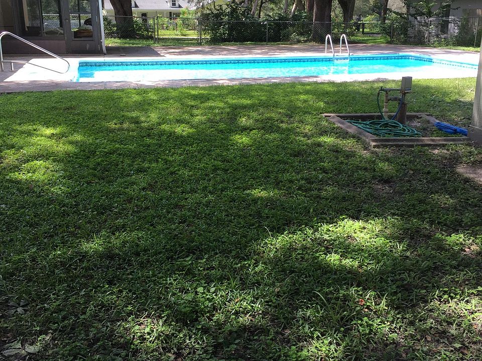 Pool with adjacent 3 season porch