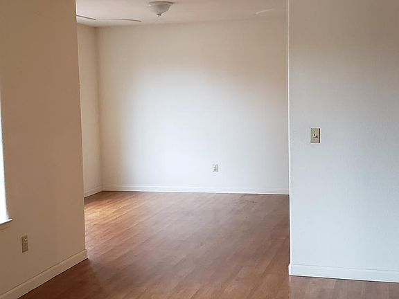 Living room leading to formal dining