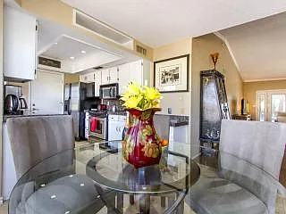 Open concept joins kitchen, dining and living areas