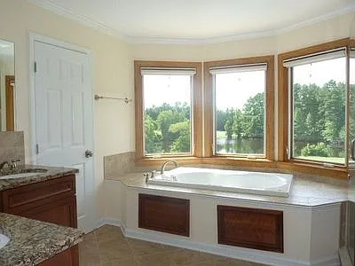 Primary bathroom. Care for a soak in a whirlpool tub?
