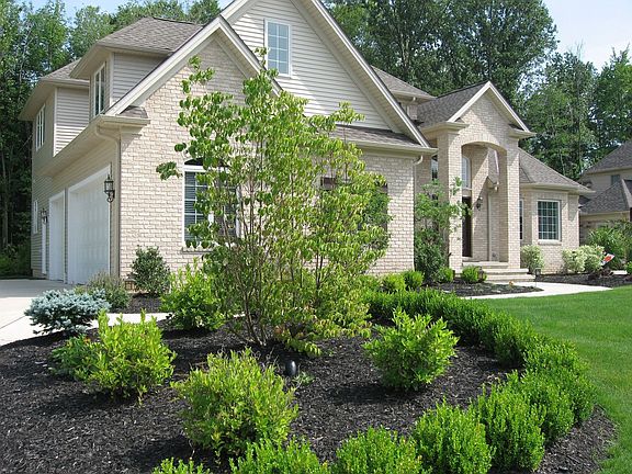 Exterior: front entry / landscaping.