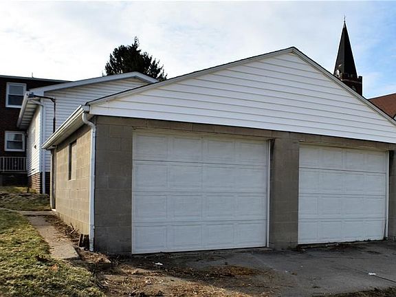 Two Car attached garage - Auto door opener for one side.