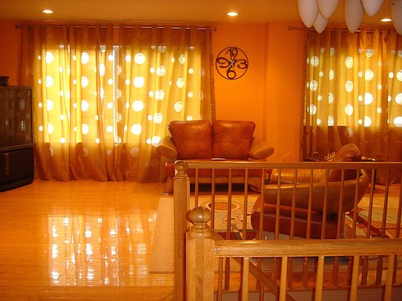 Bright formal living room with upgraded bamboo floors