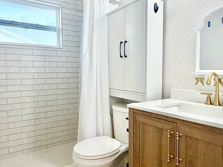 Remodeled bath with walk in shower