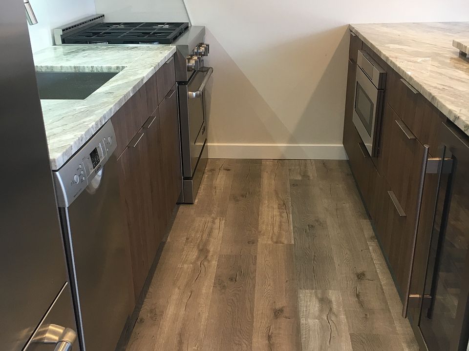 Appliance package includes a wine fridge and microwave drawer