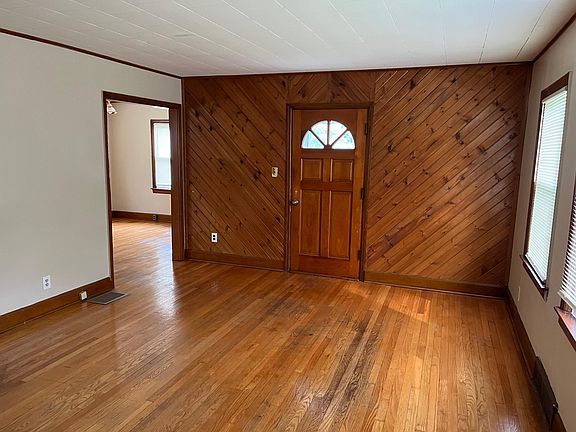 living room with door to side porch