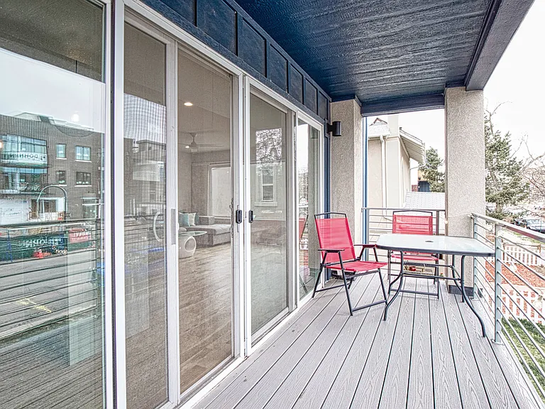 Front balcony off kitchen and living room