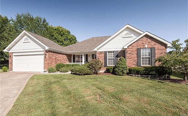 Front elevation with nice curb appeal.