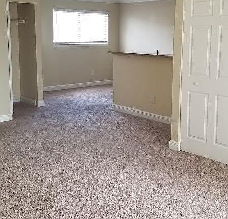 Living room into Dining and Kitchen