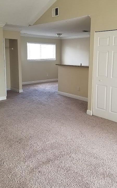 Living room into Dining and Kitchen