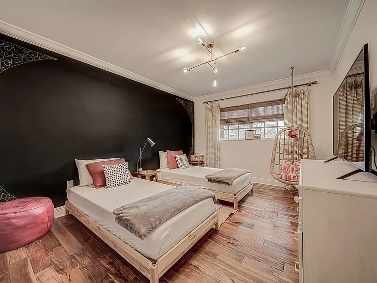 Second bedroom has a chalk board wall and room enough for a king or even two twin beds.