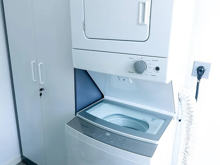 The apartment includes your own laundry room with clothes folding table.