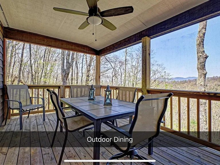 Walk out from the master to this screened dining porch , adjacent to the main deck.