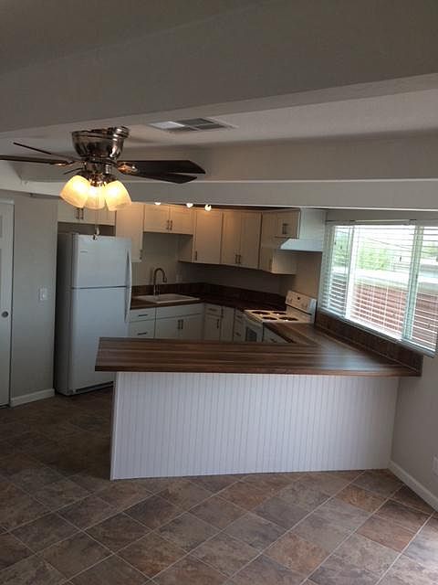 Large open kitchen with eat at bar