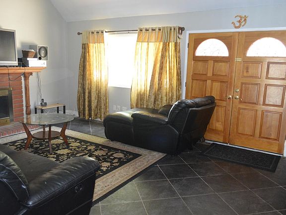 Living showing front door