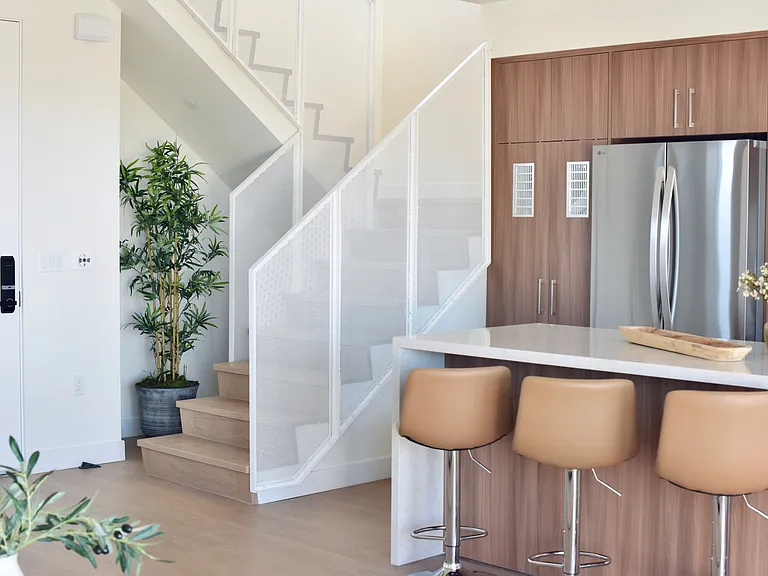 Professionally Designed Interiors. Waterfall Kitchen Island.