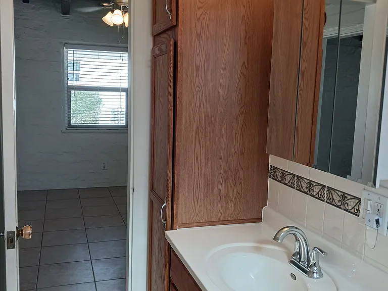 BATH INTO BEDROOM