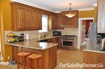 Gourmet Kitchen
						:
						Completely Renovated Gourmet Kitchen with Kitchenaid Commercial 36 inch Stove
