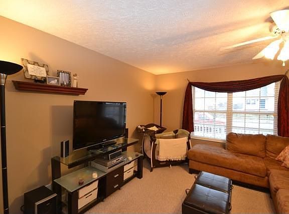 This living room is able to handle a lot of furniture or a little.