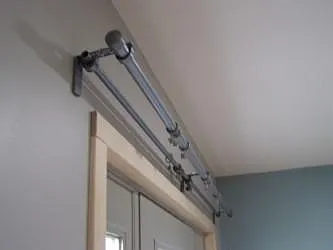 Living room double curtain rod. Coordinating drapery is furnished.