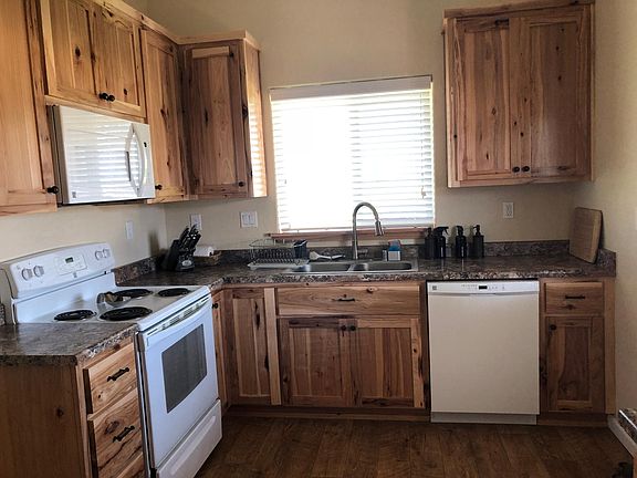 Custom hickory cabinets throughout with "soft" close drawers.