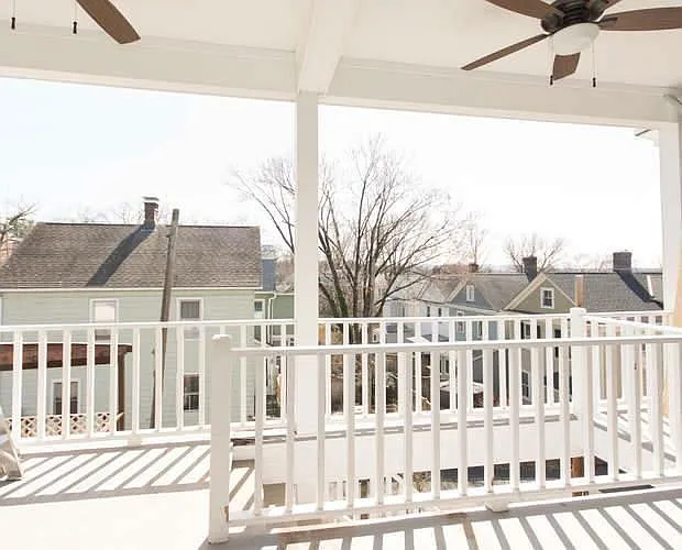 Outdoor deck with ceiling fans and electric