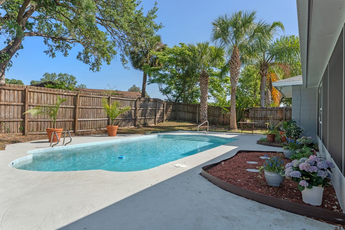 Jump into your refreshing pool! Check out the freshly painted pool deck.