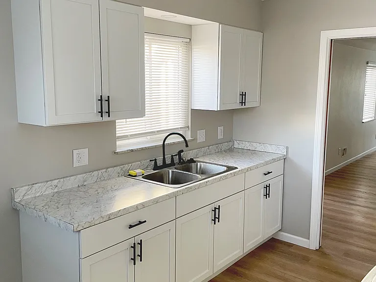Brand new modern cabinets and fixtures, sleek look