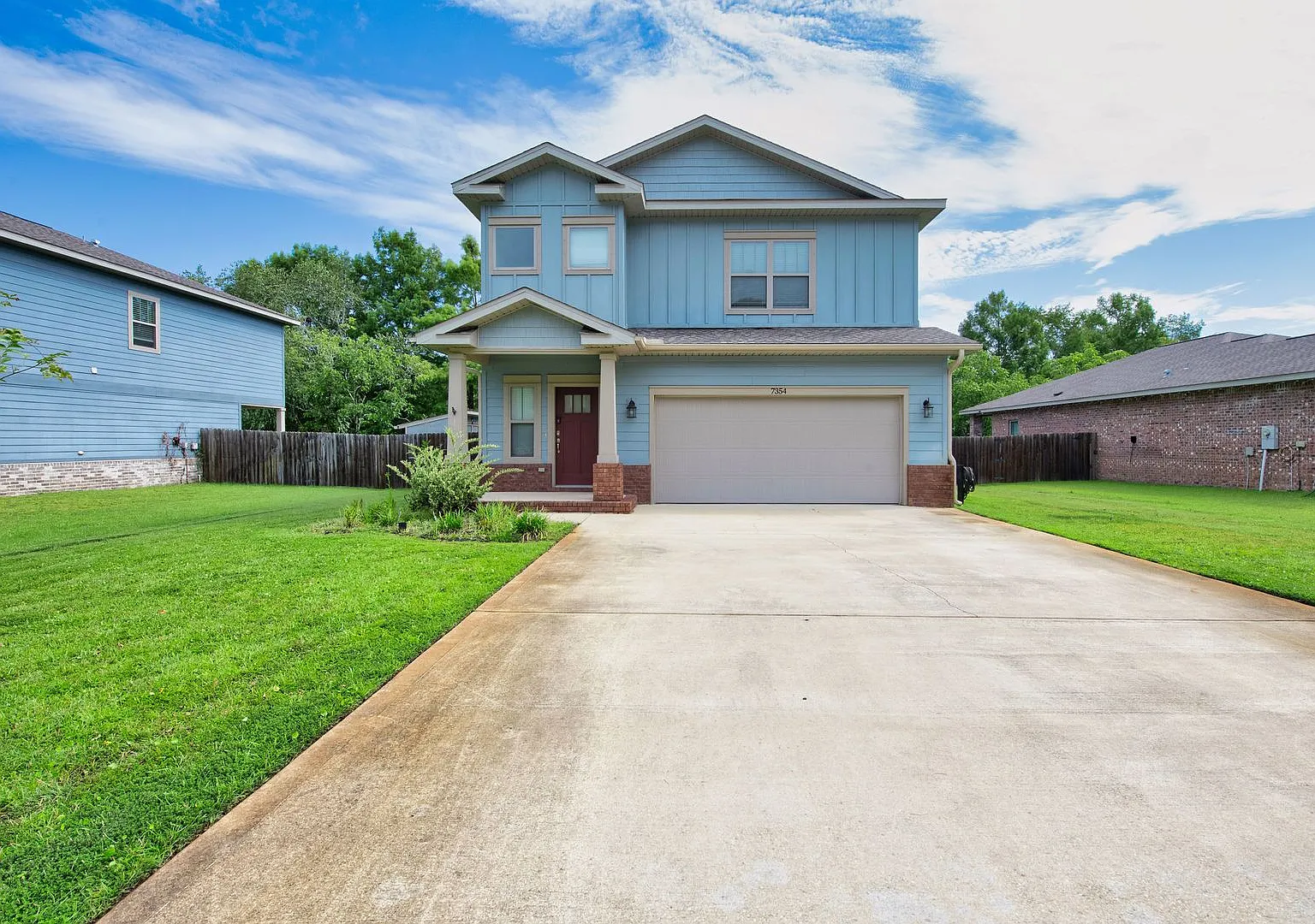 Two-Story Navarre Home with SOLAR, 2-Car Garage & Incredible Backyard! | Professional Photos Comi... — Photo 2