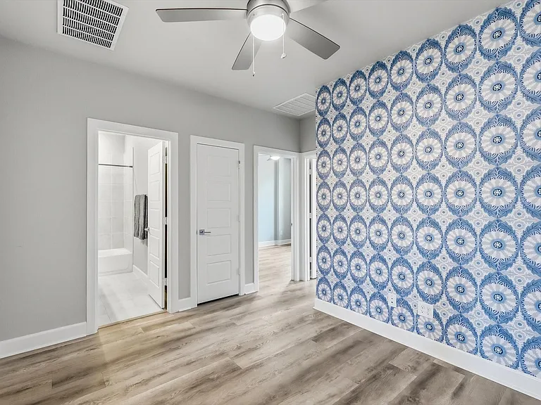 At top of stairs this flex space can be used as a game room, office or fitness space.