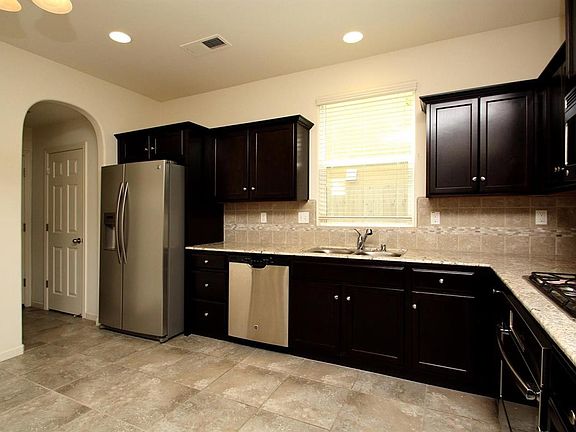 Kitchen with stainless steel appliances
