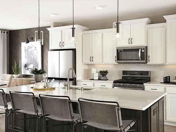 Spacious kitchen with beautiful cabinetry