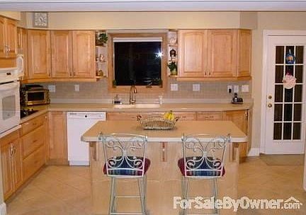 Front of House- Alt View
						:
						Front of House- Extra Parking Space on the side