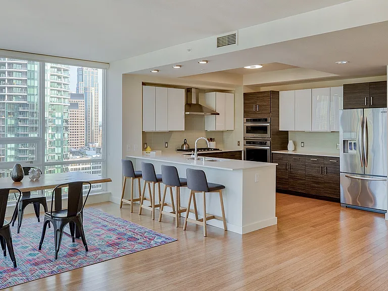 Our PH4 features an open layout with continuous bamboo flooring throughout the living space
