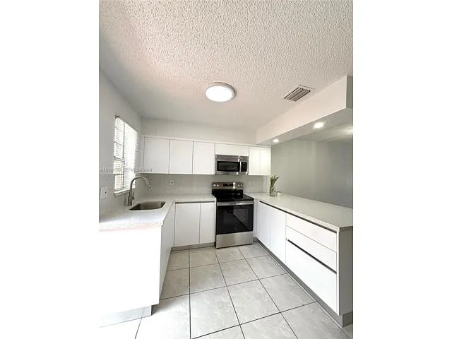Building Photo - 1460 NW 41st St