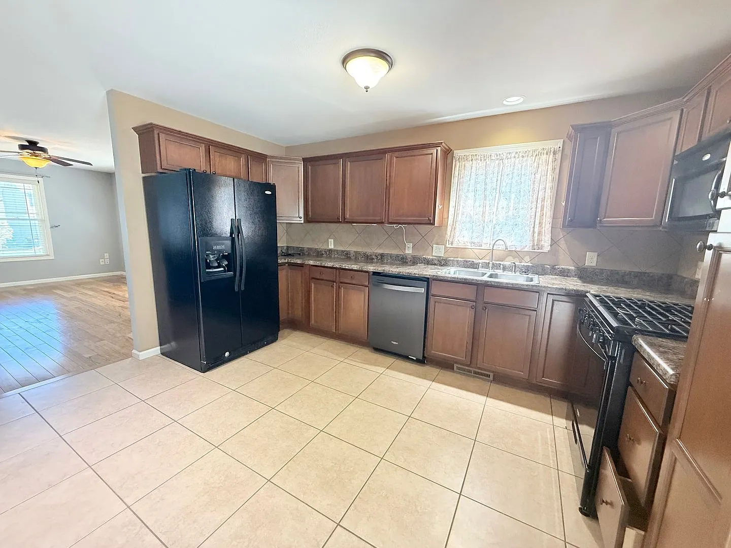 Spacious 4-Bedroom Home with Finished Basement & 2-Car Garage — Photo 3