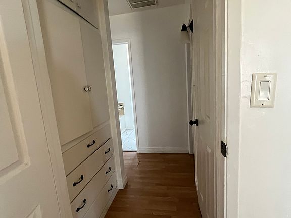 Hallway with built in drawers