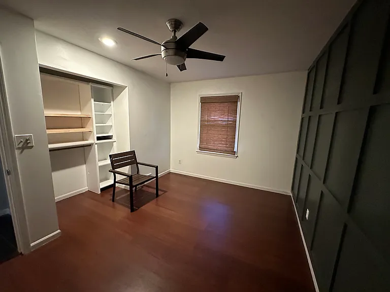bedroom #2 upstairs with finished accent wall