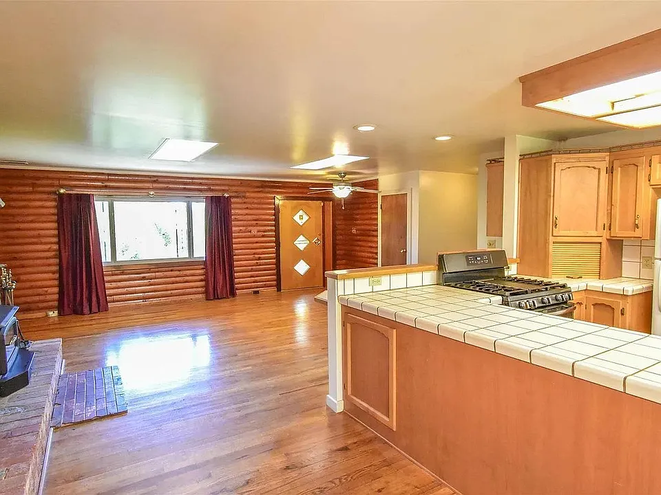 Kitchen-dining area with fireplace stove