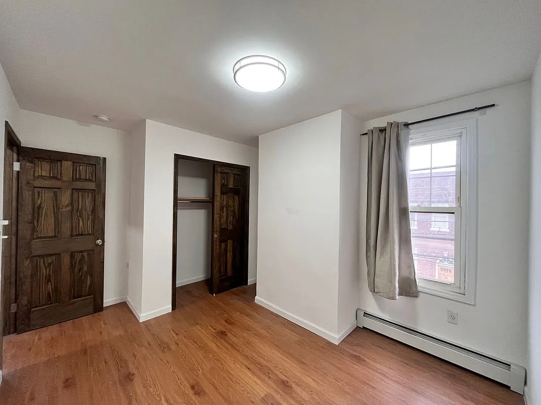 Building Photo - 64-03 Perry Ave #2