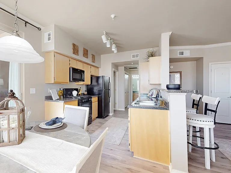 Step into this elegant kitchen designed for modern living, where functionality meets style.