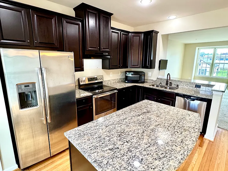 163 Moul Ave - Kitchen with Large Granite Island with Electric